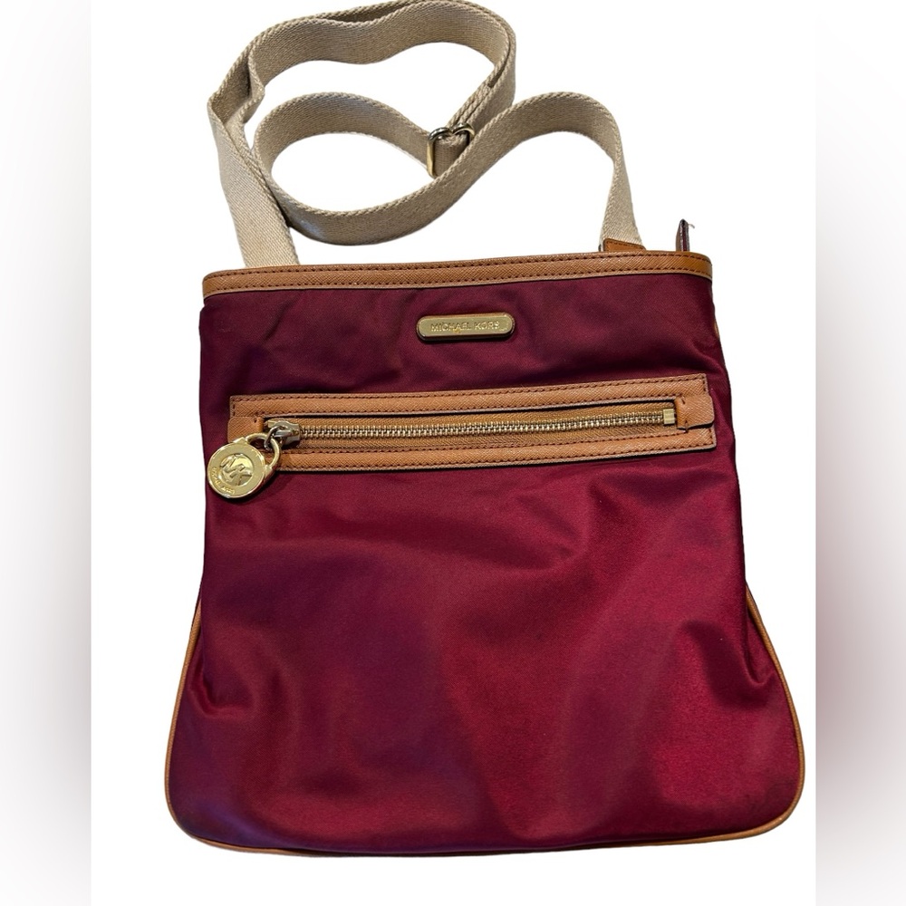 Michael Kors pretty cranberry cross over bag in nylon.
